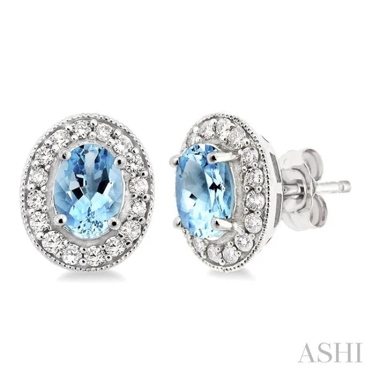 7x5 MM Oval Cut Aquamarine and 3/8 Ctw Round Cut Diamond Earrings in 14K White Gold