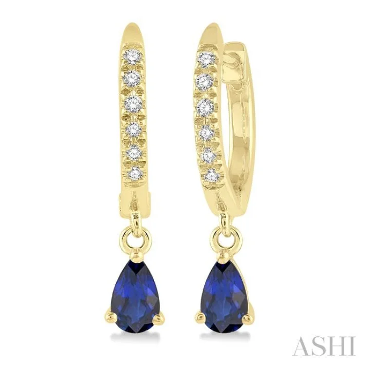 1/8 Ctw Round Cut Diamond & 5x3 MM Pear Cut Sapphire Petite Fashion Huggie Earrings in 10K Yellow Gold